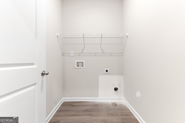 707 Jasmine Dr, Macon, GA 31211 - laundry room featuring hookup for a washing machine, hookup for an electric dryer, wood finished floors, and baseboards
