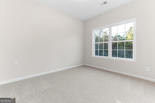 707 Jasmine Dr, Macon, GA 31211 - carpeted spare room with baseboards