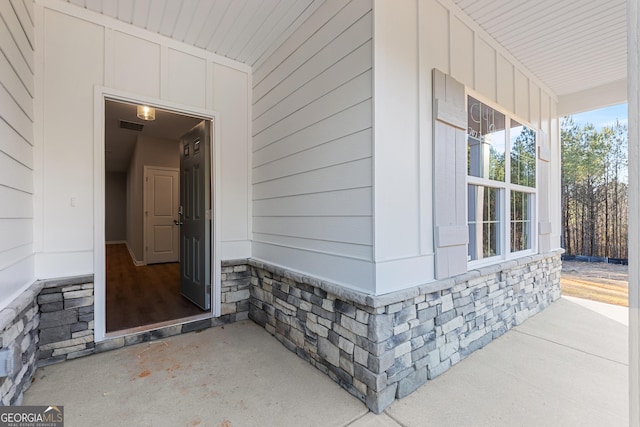 707 Jasmine Dr, Macon, GA 31211 - view of exterior entry with stone siding and covered porch
