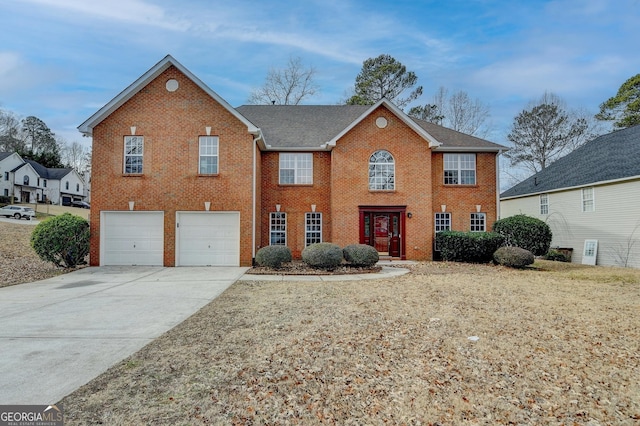 view of front of property with a garage