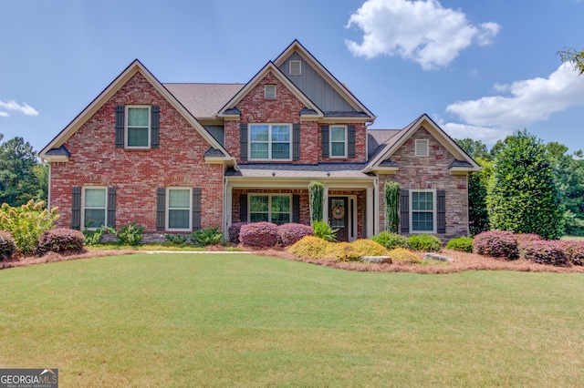 craftsman-style home with a front lawn