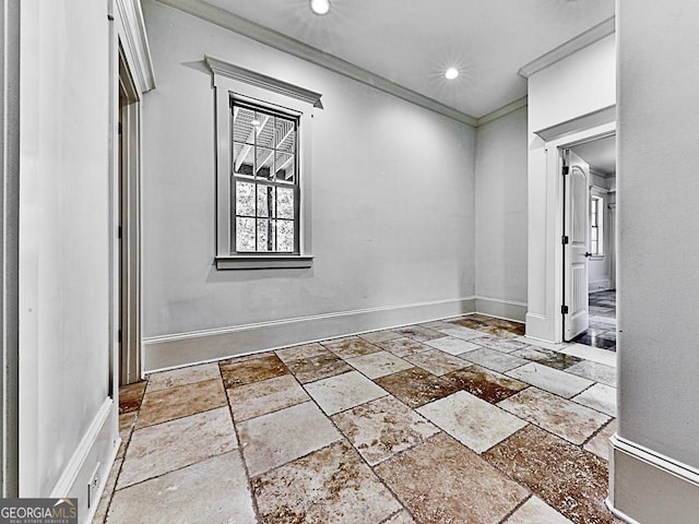 foyer featuring crown molding