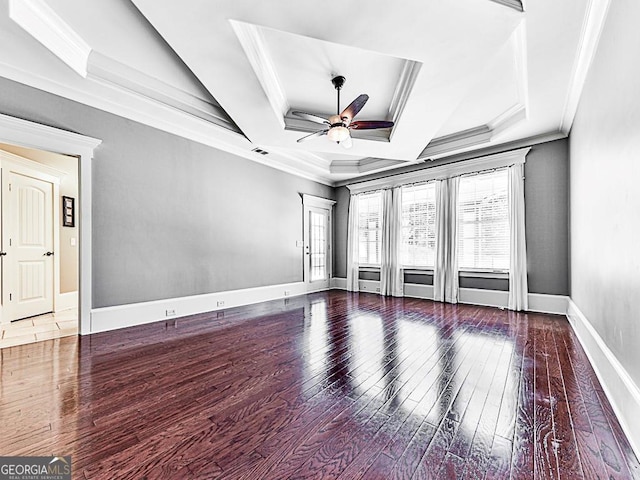 unfurnished room with a ceiling fan, hardwood / wood-style flooring, crown molding, and baseboards