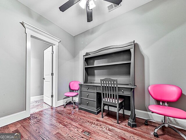 home office featuring ceiling fan and hardwood / wood-style floors