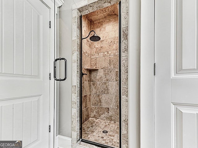 bathroom with a stall shower