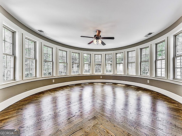 interior space featuring hardwood / wood-style flooring and ceiling fan