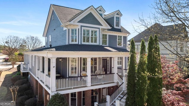 back of property featuring covered porch