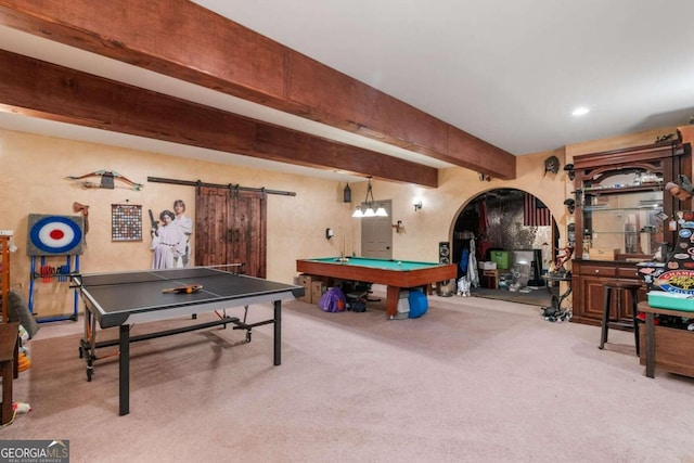 game room with a barn door, carpet flooring, pool table, and beamed ceiling