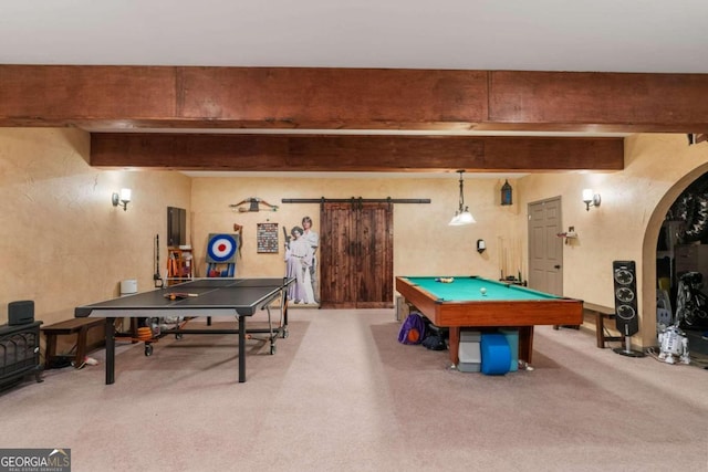 rec room with a barn door, pool table, carpet flooring, and beamed ceiling