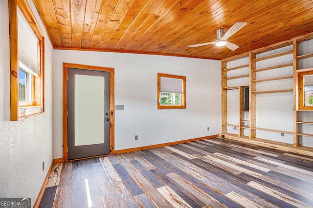 foyer featuring hardwood / wood-style floors, ornamental molding, ceiling fan, wood ceiling, and lofted ceiling