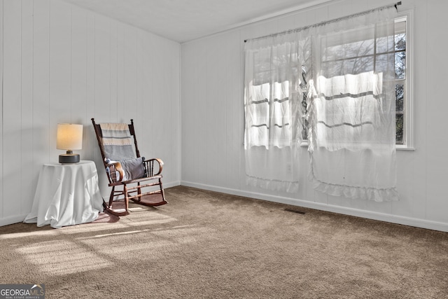 living area with carpet flooring