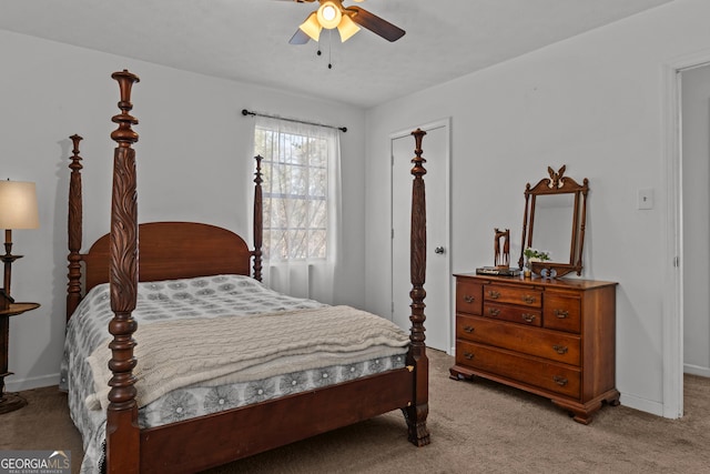 bedroom featuring ceiling fan and light colored carpet