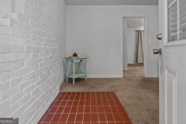 hall featuring dark colored carpet