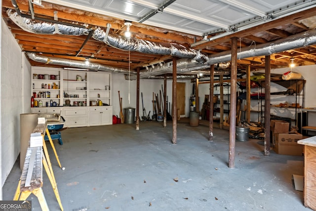 basement featuring water heater