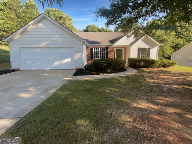 ranch-style home with a garage, concrete driveway, brick siding, and a front yard