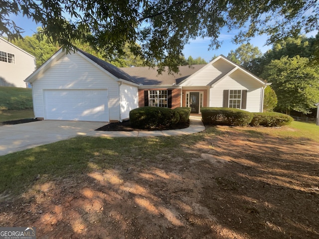 single story home featuring an attached garage, concrete driveway, and brick siding