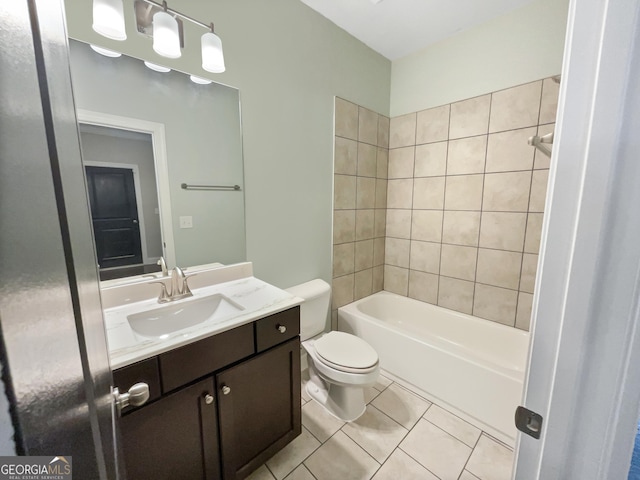 full bathroom featuring tile patterned flooring, shower / bath combination, vanity, and toilet