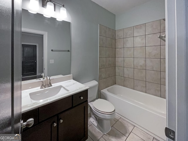 bathroom with shower / bath combination, vanity, toilet, and tile patterned floors