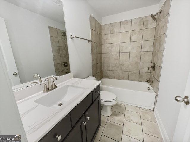 full bath featuring shower / bathtub combination, toilet, vanity, baseboards, and tile patterned floors