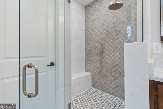 bathroom with an enclosed shower