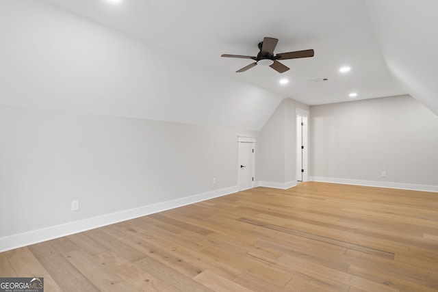 additional living space featuring ceiling fan, light hardwood / wood-style flooring, and lofted ceiling