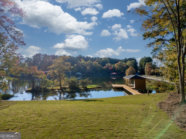 water view featuring a dock