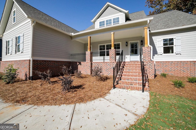 view of front of home featuring covered porch