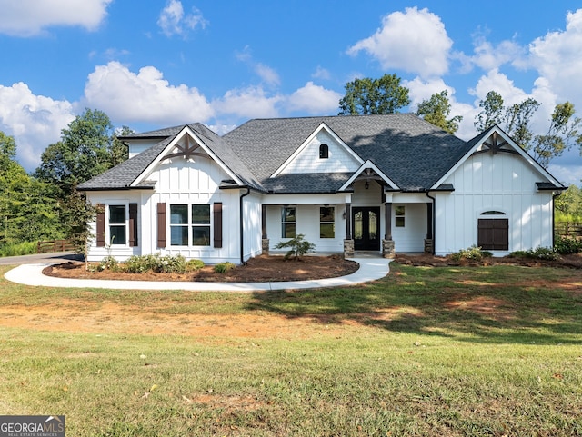 modern farmhouse with a front yard