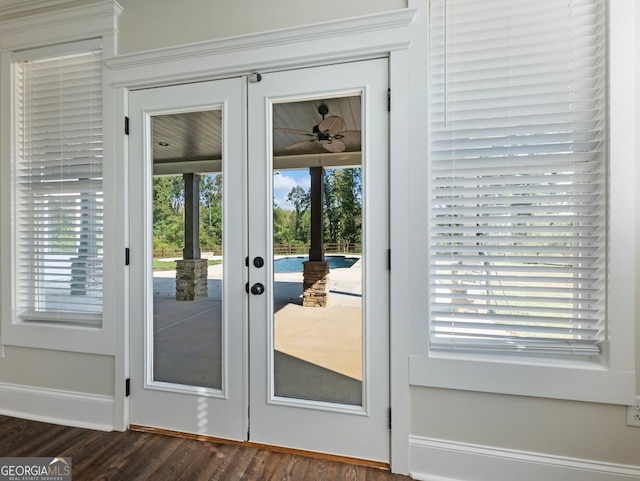 doorway featuring french doors and dark wood-type flooring