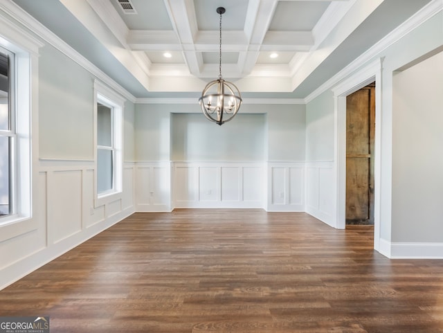 unfurnished room featuring dark wood-type flooring, coffered ceiling, and a healthy amount of sunlight