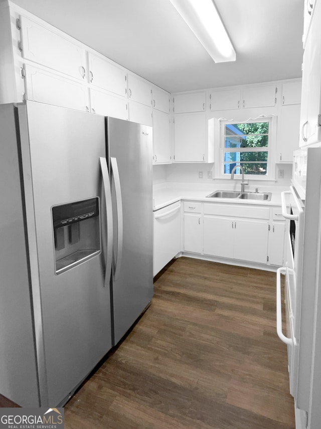 kitchen featuring white cabinetry, dark wood-type flooring, white appliances, and sink