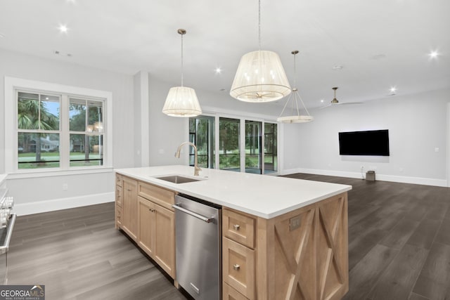 kitchen with dark hardwood / wood-style flooring, stainless steel dishwasher, ceiling fan, sink, and an island with sink