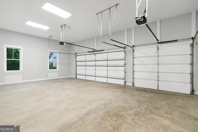 garage featuring a garage door opener