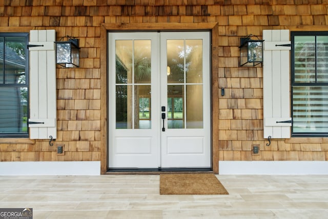 property entrance featuring french doors