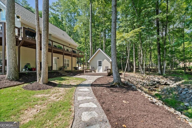 view of yard with a deck