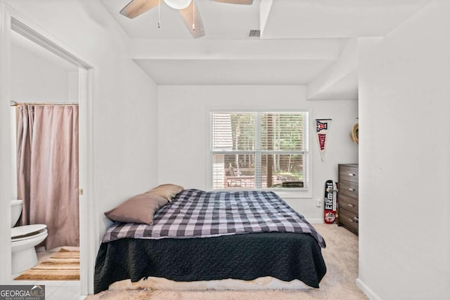 bedroom featuring ceiling fan and light carpet