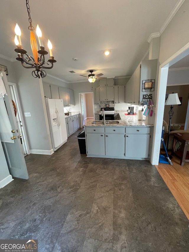 kitchen featuring ceiling fan with notable chandelier, decorative light fixtures, dark hardwood / wood-style flooring, ornamental molding, and white fridge with ice dispenser