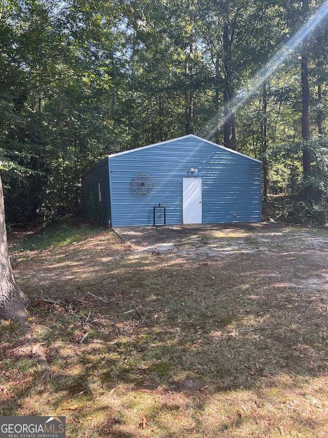 view of outdoor structure featuring a garage