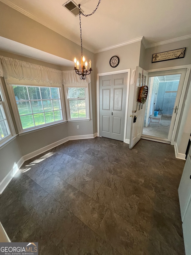 interior space with ornamental molding and a notable chandelier