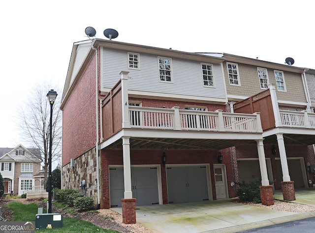 back of property featuring a garage