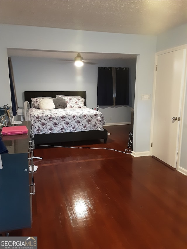 bedroom with wood-type flooring