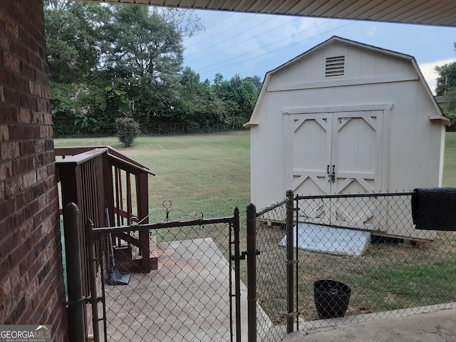 view of outbuilding with a yard