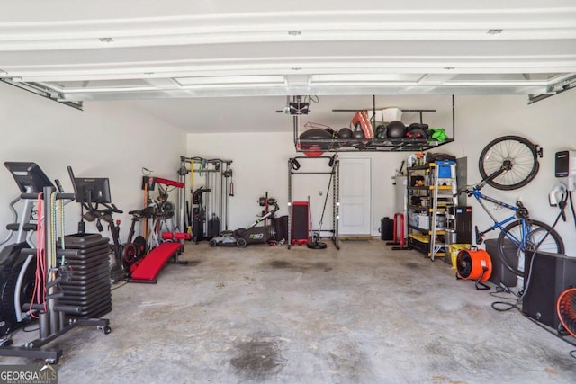 garage featuring a garage door opener