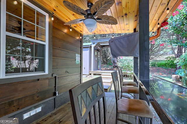 wooden terrace with ceiling fan