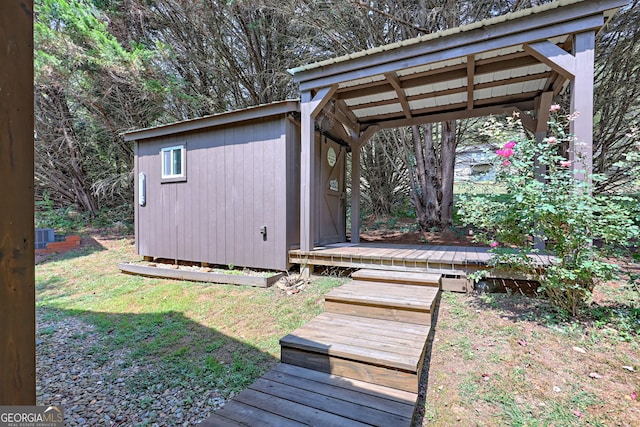 view of outbuilding with a yard