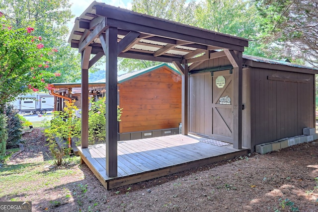 wooden deck with a storage unit