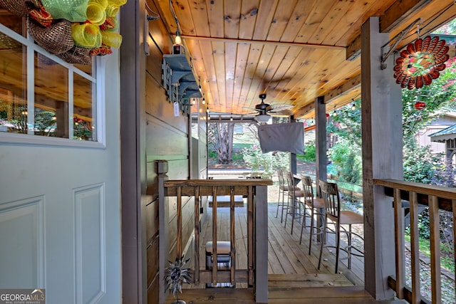 wooden terrace with ceiling fan