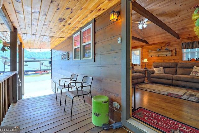 wooden terrace with ceiling fan