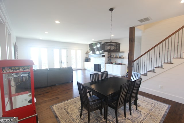 dining room featuring dark hardwood / wood-style floors