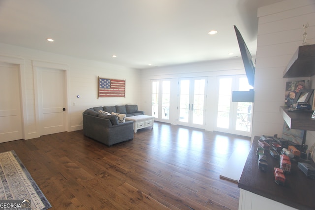 living room featuring dark wood-type flooring